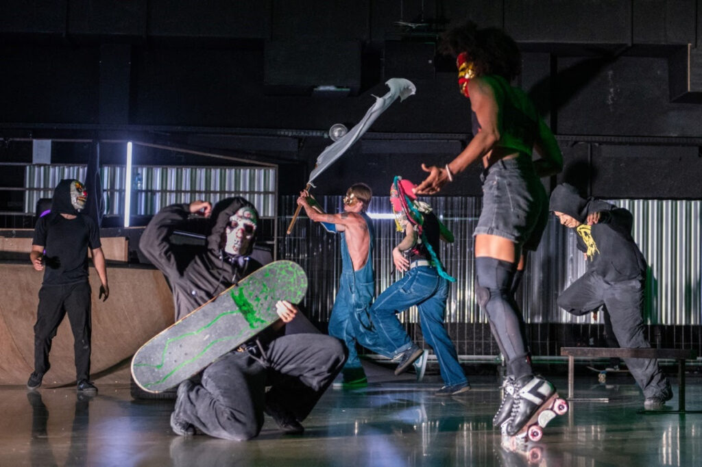 Skateboarders using their boards on a theatre stage